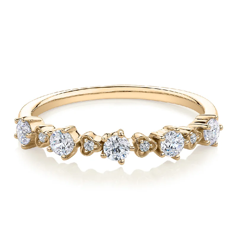 Wedding or eternity band with 0.32 carats* of diamond simulants in 10 carat yellow gold