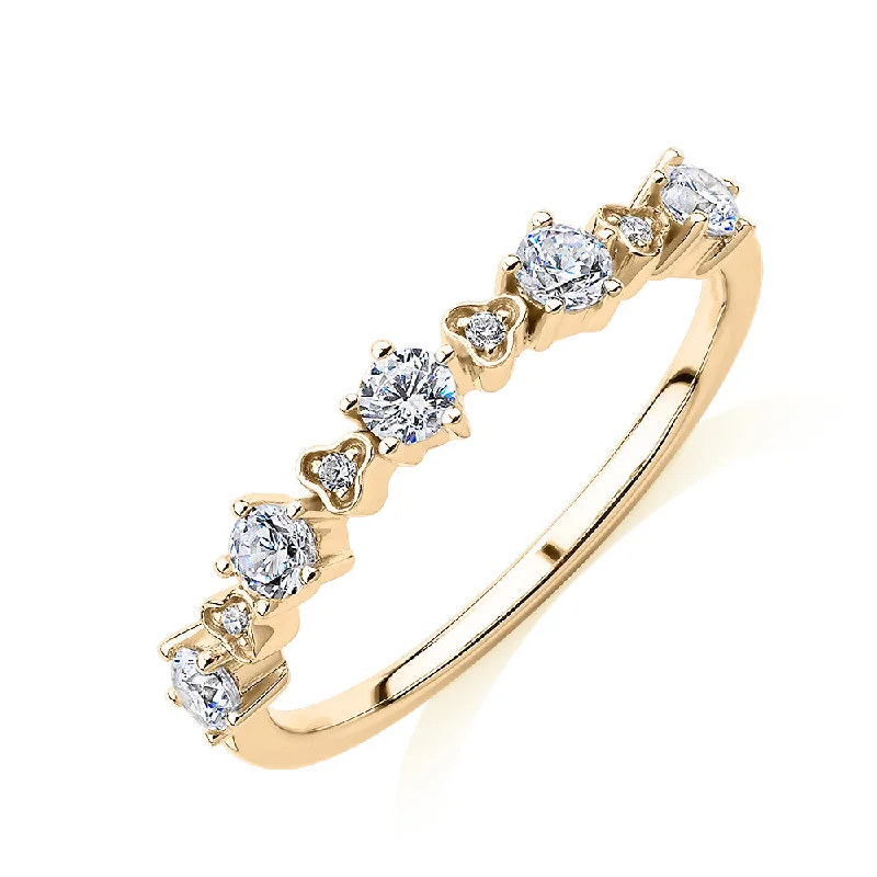 Wedding or eternity band with 0.32 carats* of diamond simulants in 10 carat yellow gold