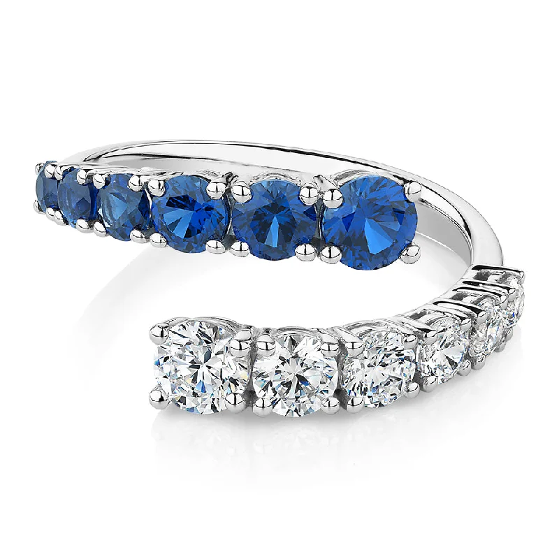 Dress ring with sapphire simulants and 0.91 carats* of diamond simulants in 10 carat white gold